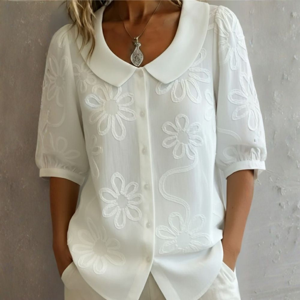 Clara - Blusa con cuello Peter Pan y bordado floral
